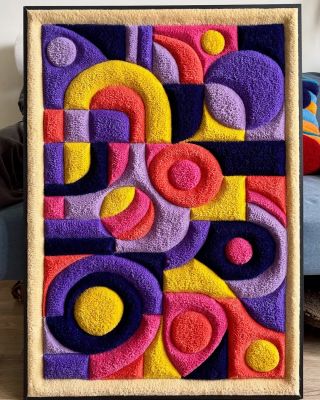 @pey_pey_rugs delivers a cosmic collision of color and geometry — this sculpted tufted wall piece turns wool into pure...