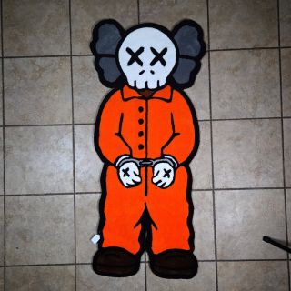 @selfmadecustomss turns a pop art icon into a bold statement piece — this handcuffed figure in high-vis orange doesn’t...